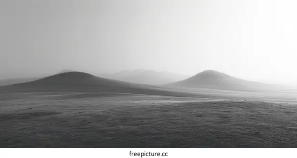 Black and white foggy mountain landscape