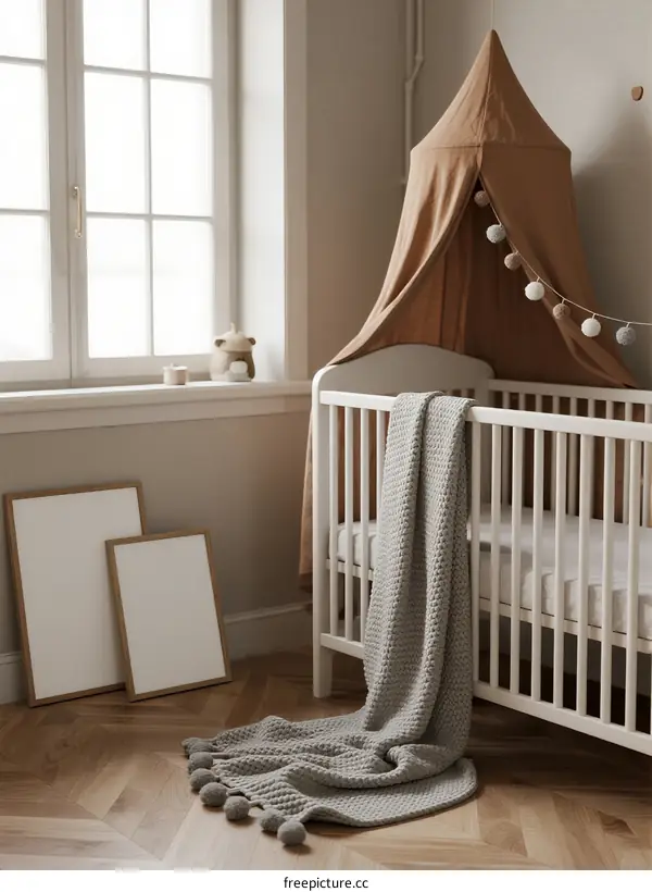 Modern white baby cot with brown canopy and soft gray blanket