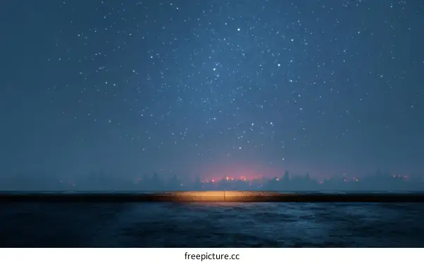 Night Sky Over a Foggy Cityscape