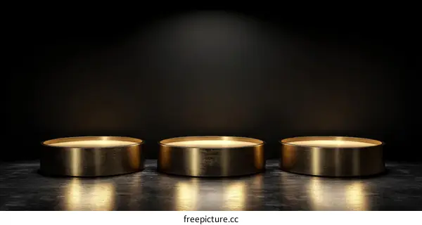 Three Gold Podiums on Dark Background