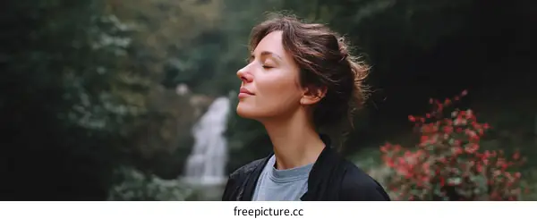 Woman Breathing Fresh Air in Nature