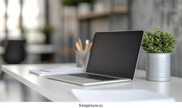 Modern Workspace Laptop Setup with Accessories