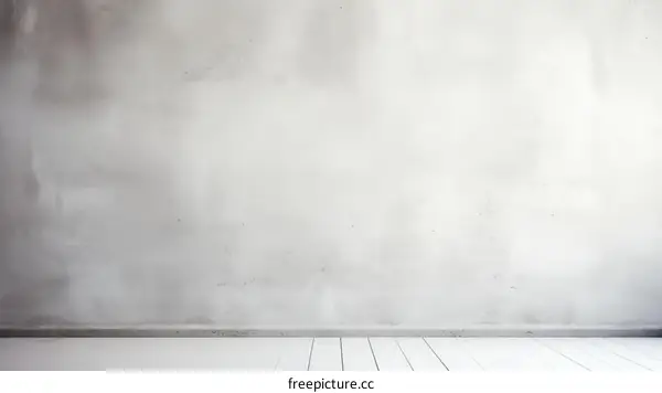 Whitewashed concrete wall texture background with wooden floor