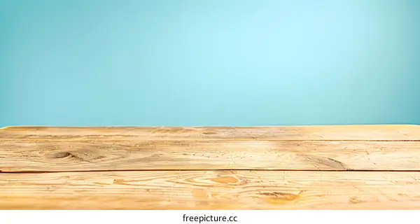 Light Blue Background Wooden Table Top