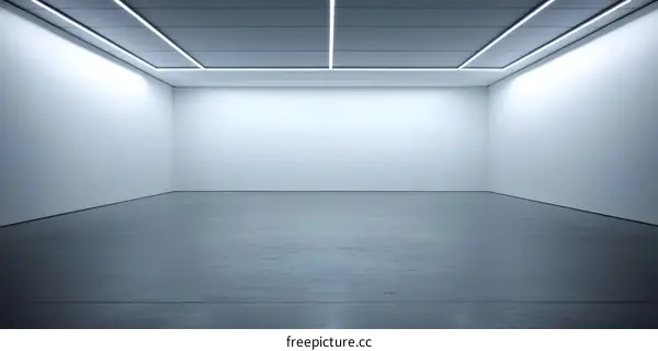 Empty Room with White Walls and Concrete Floor