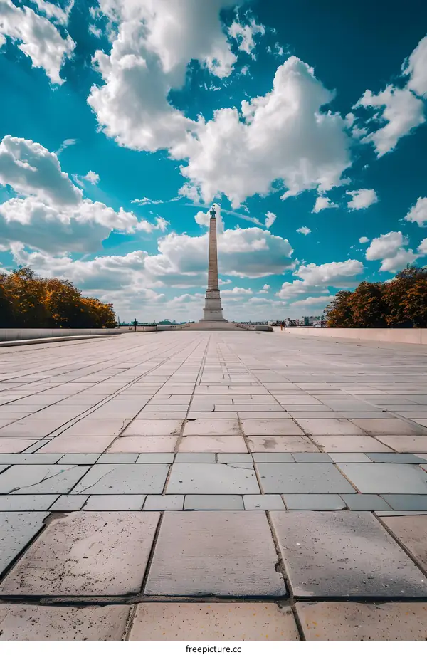 Tall Stone Monument in a City Park
