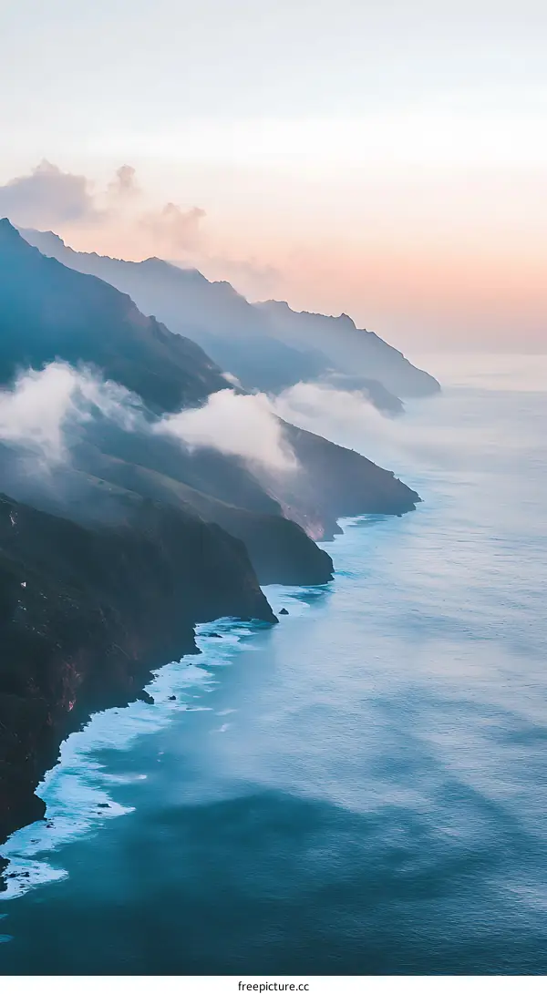 Mountain Coastline with Clouds at Sunset