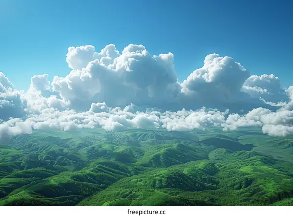 Aerial View of Lush Green Mountains and Cloudscape