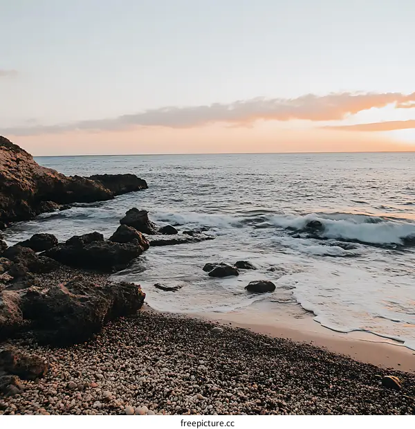Seascape of Sea and Rocky Beach at Sunset