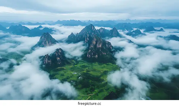 Majestic Mountain Range Covered in Clouds