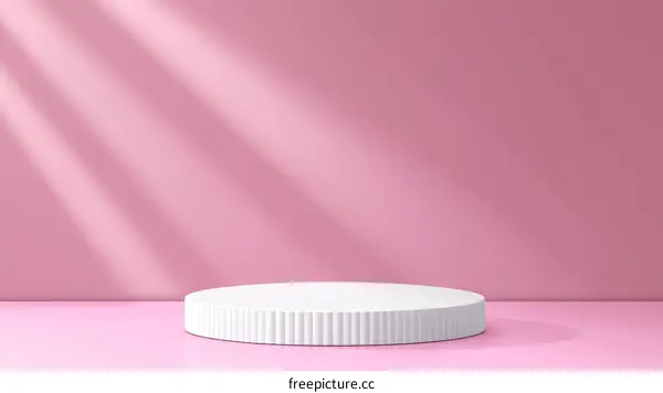 White Round Podium Against Pink Background