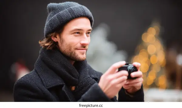 Stylish Man Taking Photos on a Winter Day