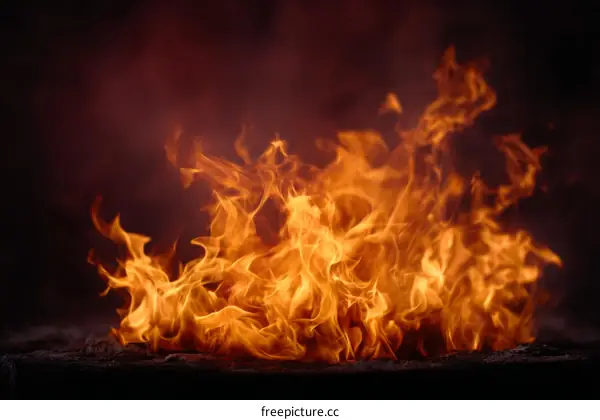 Fiery Flames in Dark Background
