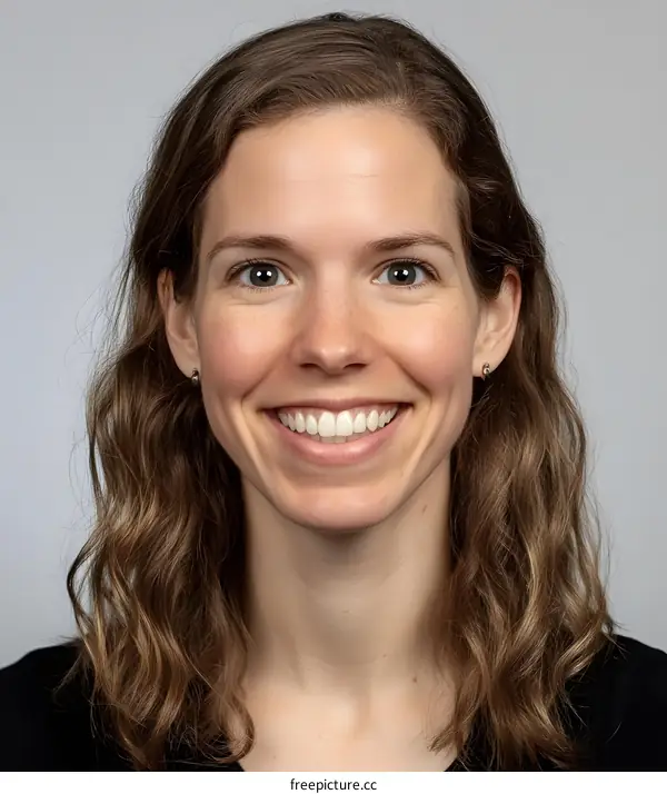 Smiling Woman with Long Brown Hair