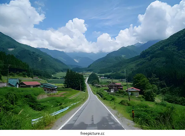 A road through a valley in the mountains