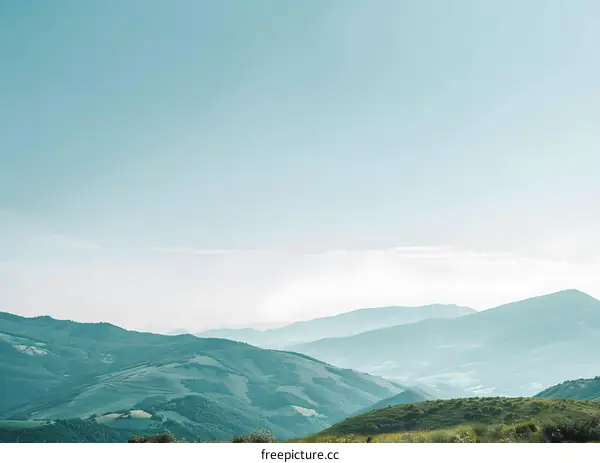 Green Hills and Blue Sky Landscape