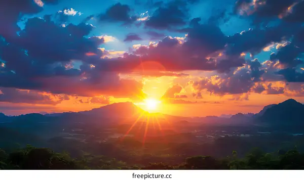 Beautiful Sunset Over Mountains With Clouds