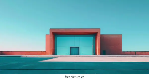 Modern Minimalist Building with Blue Glass Entrance
