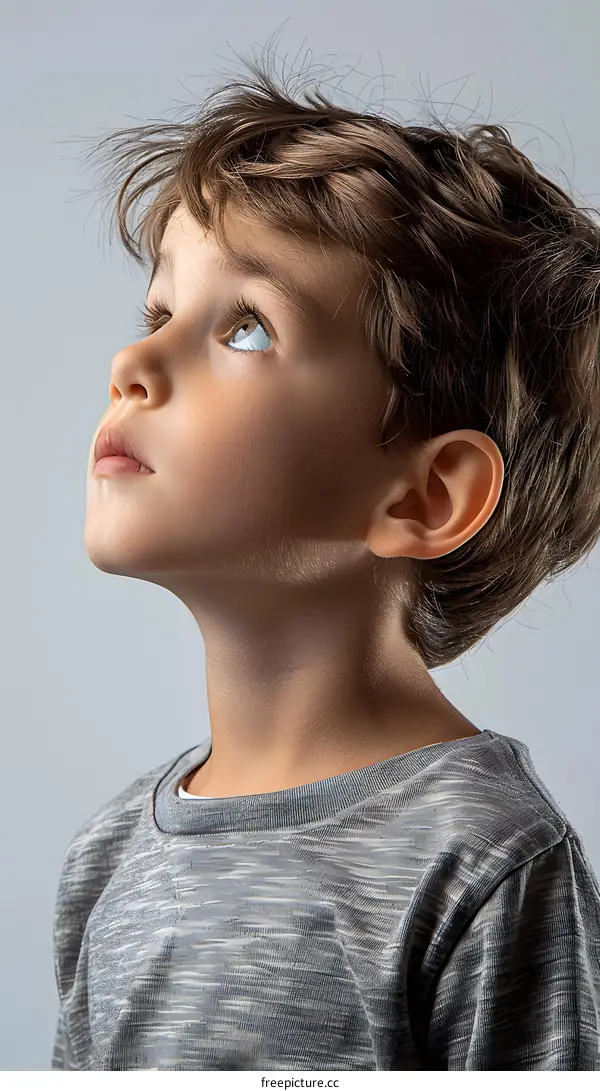 Portrait of a boy looking up