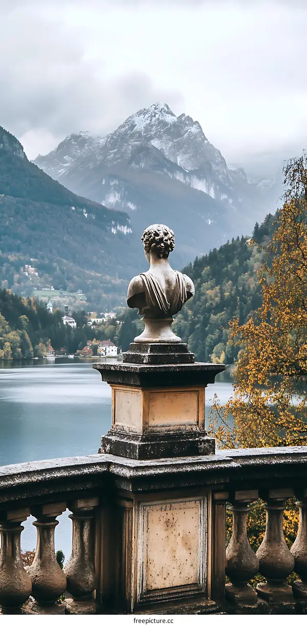 Stone Sculpture On Balustrade overlooking Mountains and Lake