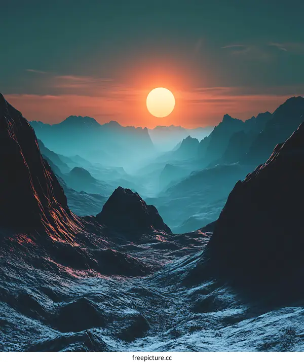 Sunset Over Mountain Range with Blue Haze