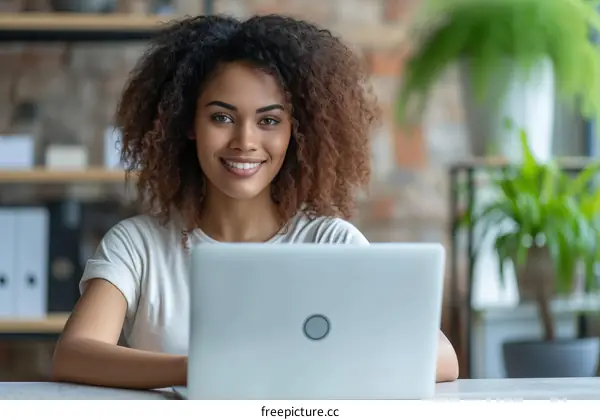 Young Woman Working on Laptop
