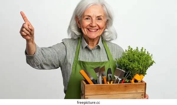 Elderly Gardener Showing Garden Tools