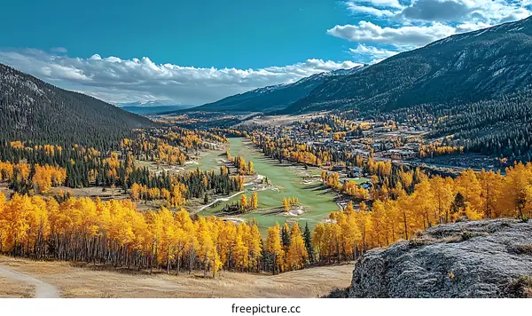 Autumn View of a Mountain Valley with Golf Course