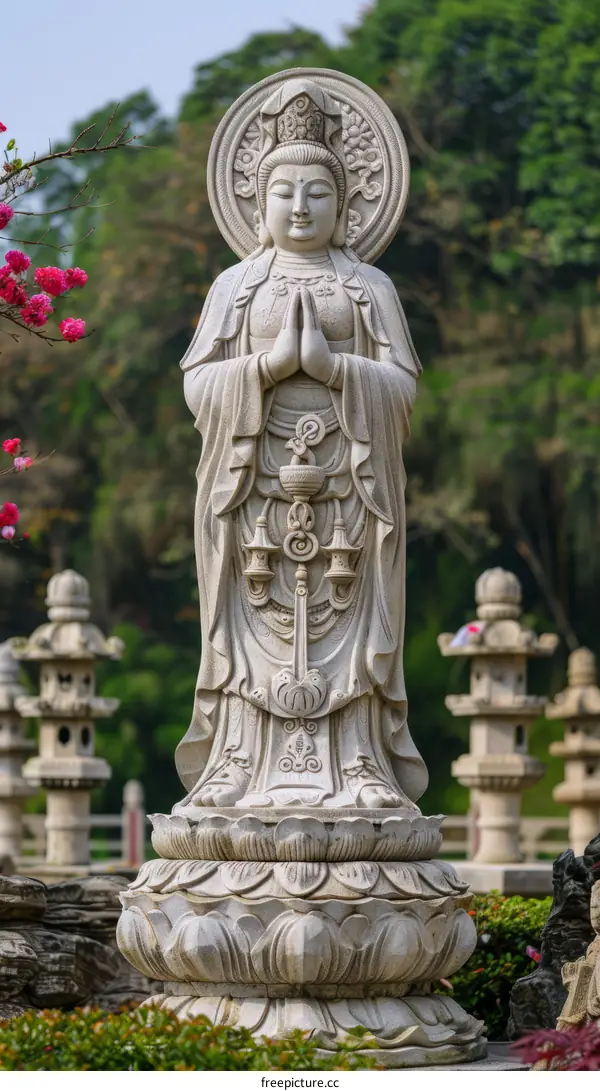 White marble statue of Avalokiteshvara, the bodhisattva of compassion, at the Lingyin Temple in Hangzhou, China