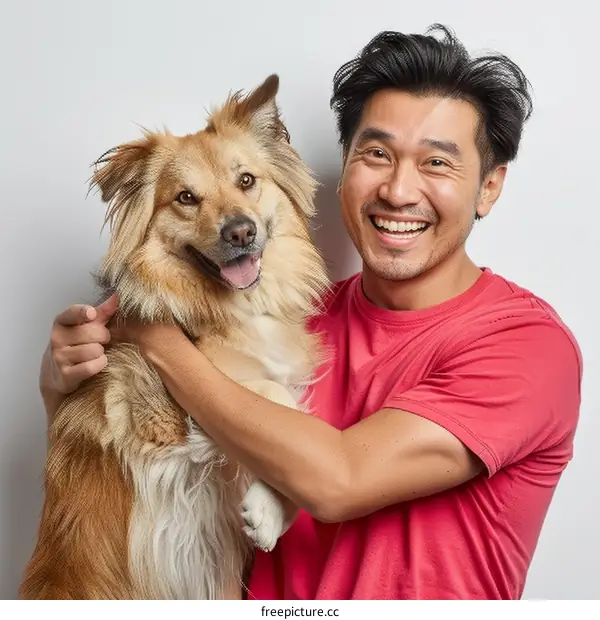 Portrait of a happy Asian man hugging his dog
