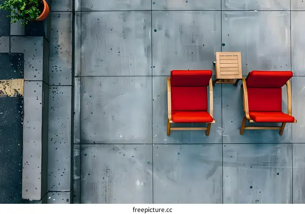 Red Chairs on Concrete Patio