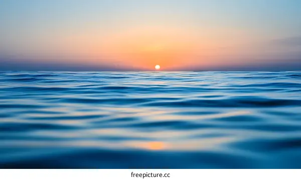 Sunrise over Calm Ocean Waters