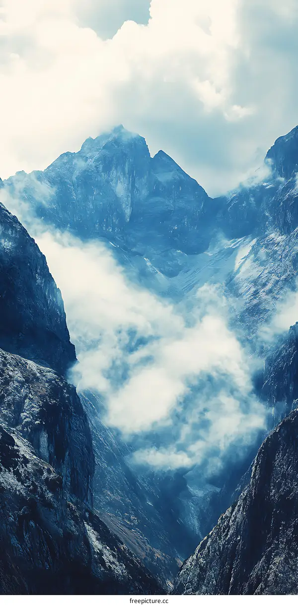 Misty Mountain Landscape with Clouds and Peaks