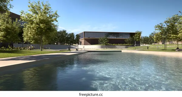 Modern Building with Reflection Pool and Trees