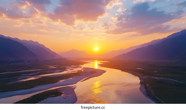Majestic Sunset Over Winding River Valley