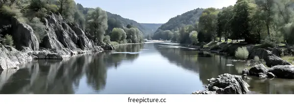 Serene River Winding Through a Picturesque Valley