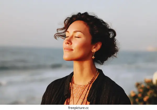 Woman enjoying the ocean breeze