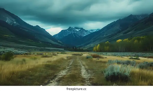 Mountain Valley Scenic Landscape Under Cloudy Sky