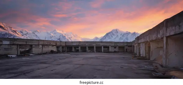 Abandoned Parking Lot at Sunrise with Mountain View