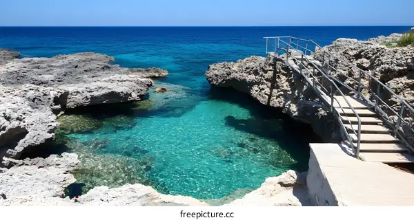 Crystal Clear Water Lagoon With Wooden Steps Leading to the Water