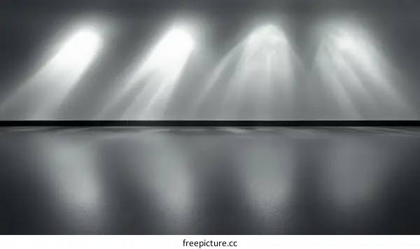 Empty Gray Space with Spotlight Beams