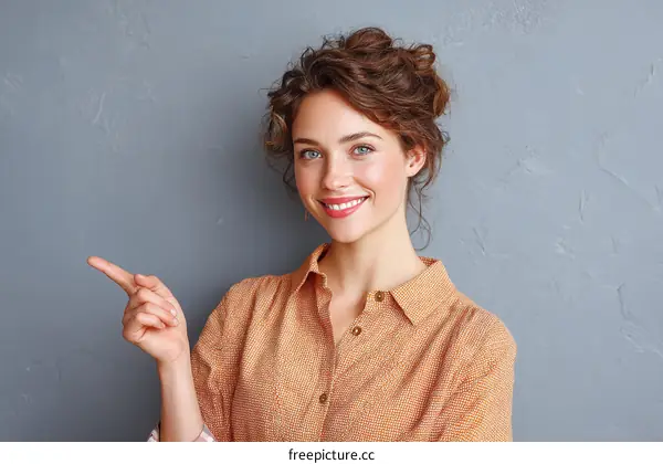 Smiling Woman Pointing,  Portrait,  Casual Style,  Studio Shot,  Light Background