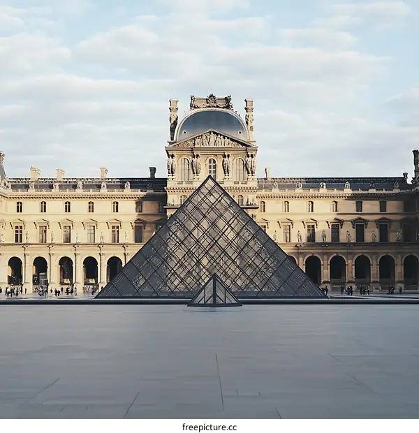 The Louvre Museum in Paris, France with the iconic glass pyramid