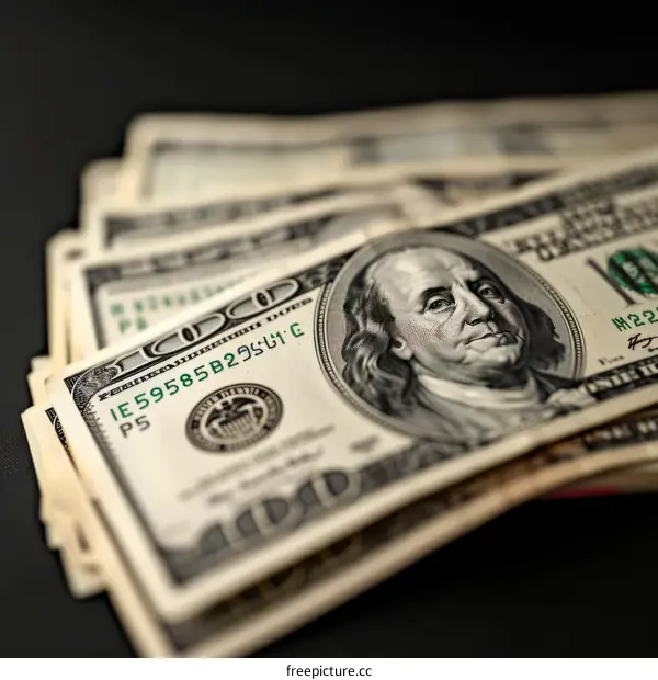 Close-up of a stack of one hundred dollar bills