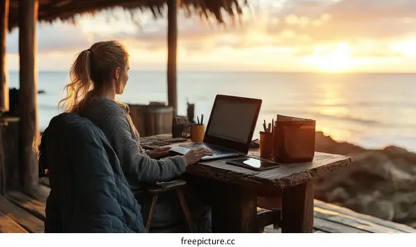 Woman Working Remotely at Sunset Beach