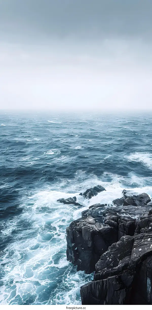 Ocean Waves Crashing Against Rocky Coast
