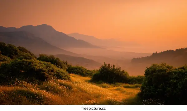 Sunrise over Misty Mountain Valley