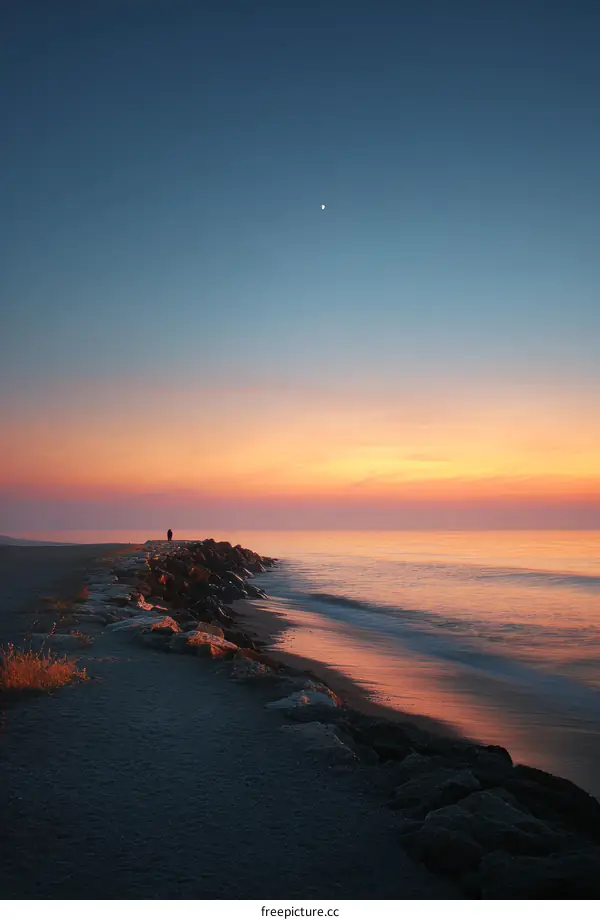 Sunrise at the Beach with a Single Figure