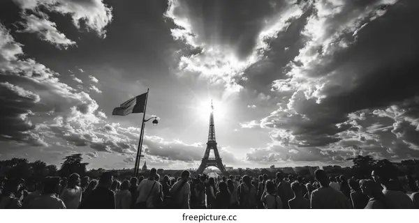 Crowds of People Gather in Front of the Eiffel Tower