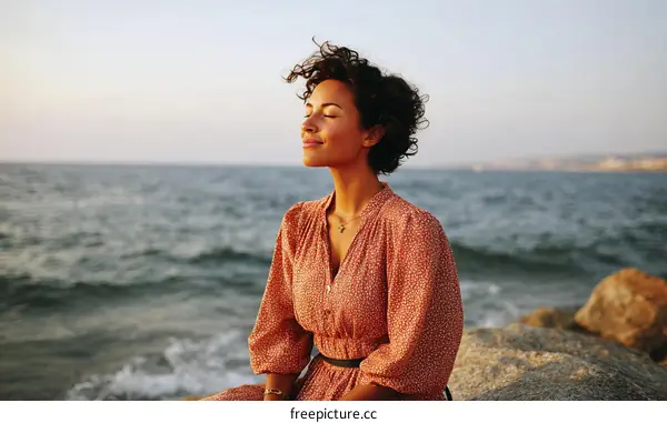 Woman Enjoying the Sunset Ocean View
